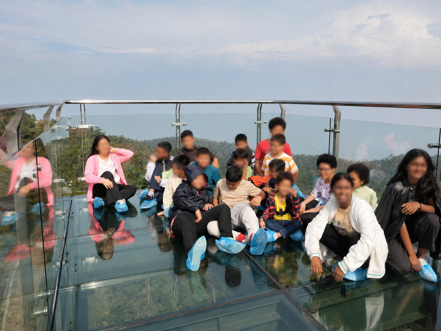 Children and caregivers of St. Joseph’s Home enjoying the Panoramic View Bridge at Gunung Jerai