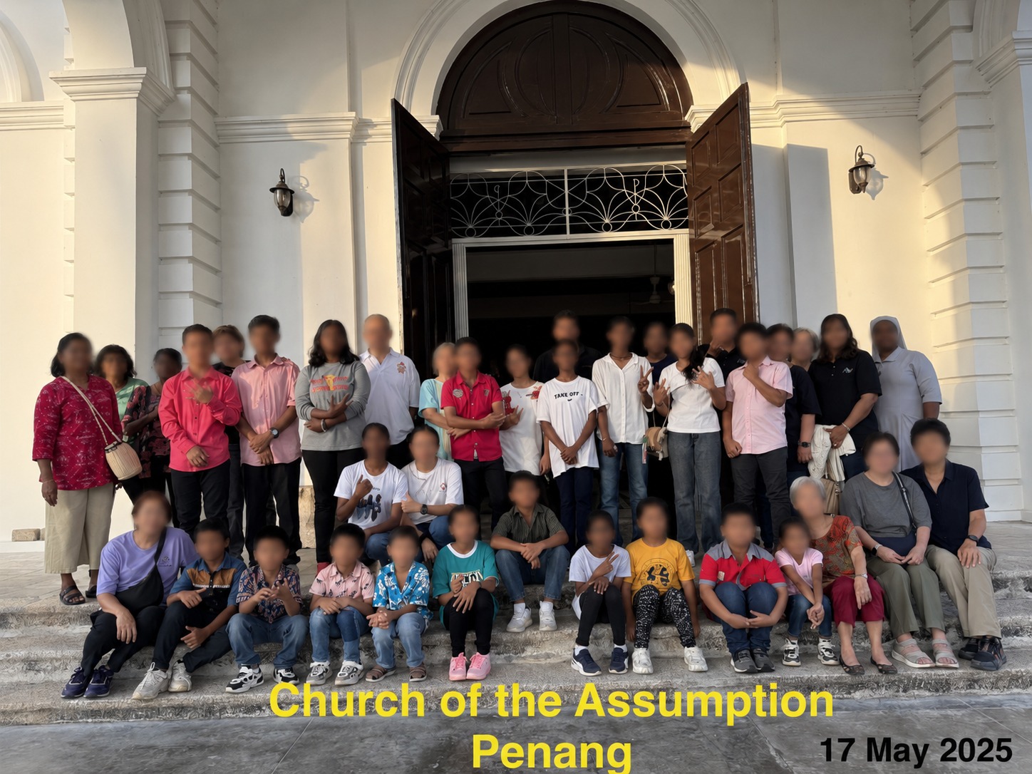 St Joseph's Home children, staff, and volunteers at the Church of the Assumption, Penang, during the pilgrimage